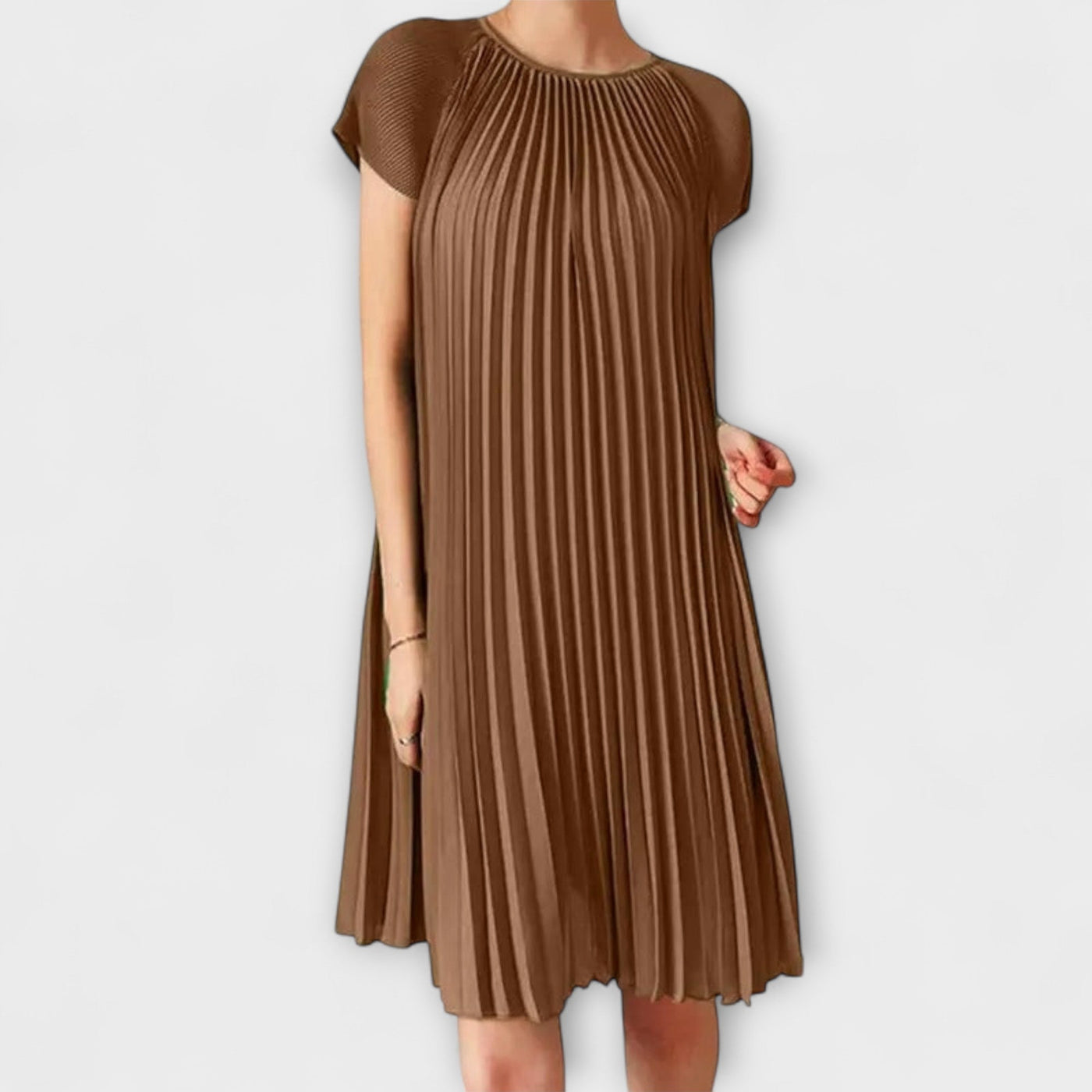 The product title remains unchanged: "Elegantes Plisseekleid".